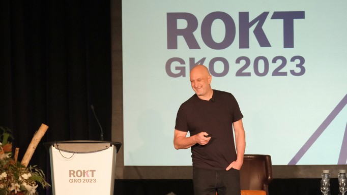 Bruce Buchanan the Founder & CEO of Rokt making a presentation at GKO 2023